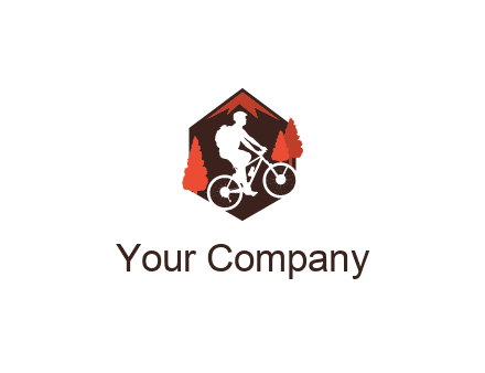 hexagonal mountain biking logo with fir trees